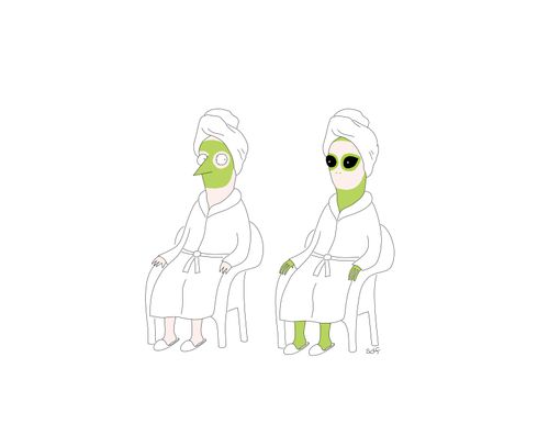 A woman with a green face mask sits next to an alien