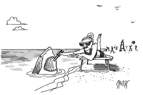 A woman is laying on a sunbed, feeding a shark sushi. 