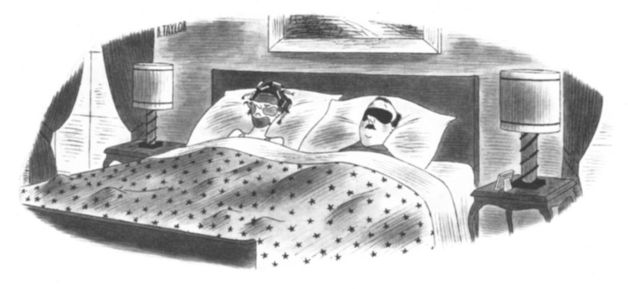 A couple lie in bed