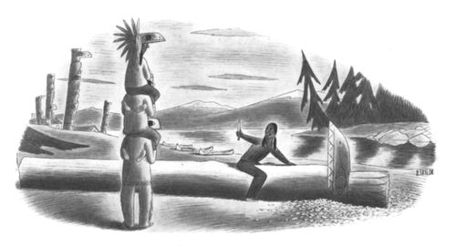 A man carves a totem pole