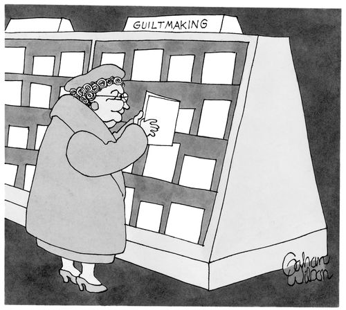 Woman Browses Section Labeled "Guiltmaking"