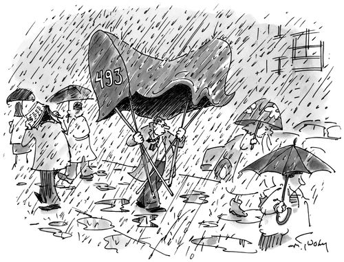 Man using an entrance canopy as an umbrella