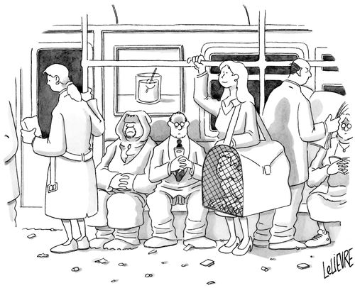 A woman waits on the subway with a man in a carrier bag.