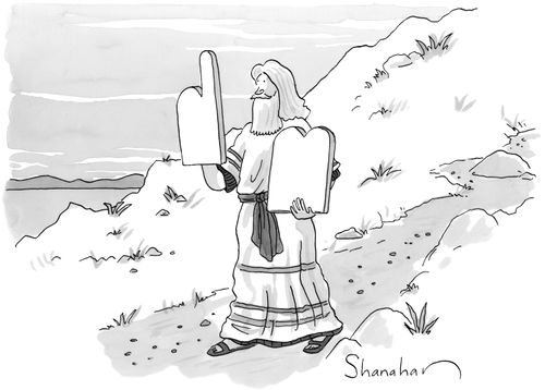 Moses holds the two tablets on which the Ten Commandments are written; one of them is shaped like a foam finger used for sporting events