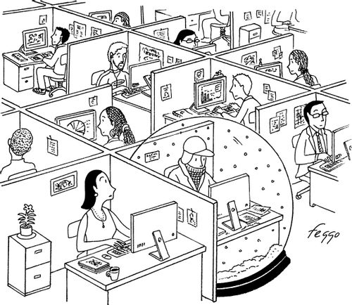 A man works in a snow globe.