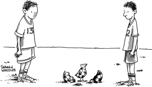 Two boys staring at a soccer ball patterned bird that has hatched from a soccer ball.
