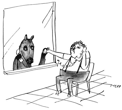 A man and horse touch hands during a prison phone call.