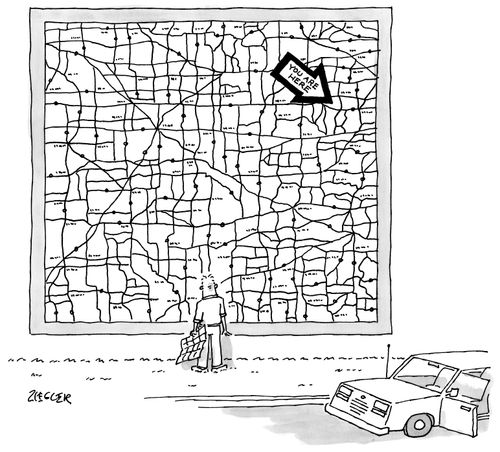 Man staring at a large confusing map
