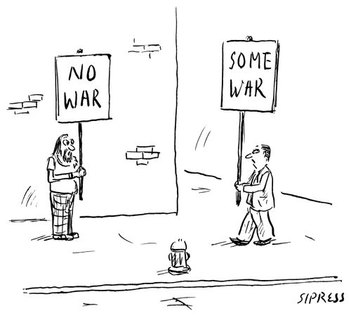 Two protesters; one is holding a sign that reads "No War" while the other is holding a sign that reads "Some war".