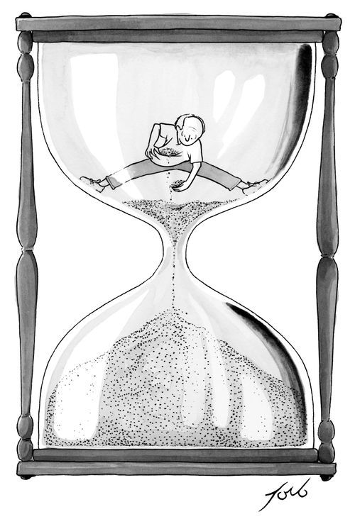 A middle aged man tries to stop time from slipping down an hourglass.