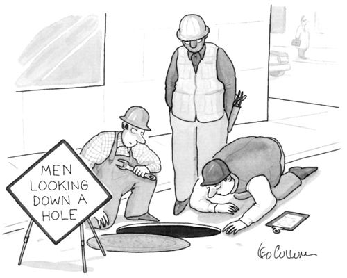 Men Looking Down a Hole