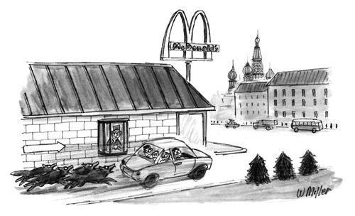 A family is chased by a pack of wild dogs at a drive-thru in Russia.