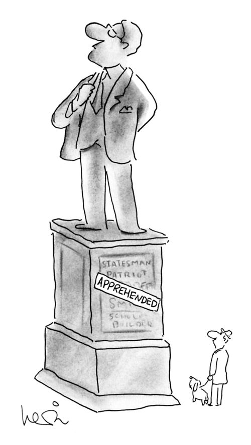 A man looking at a statue of a statesman covered by a sign saying "Apprehended"