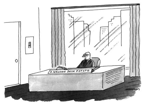 A businessman sits behind a desk; a nameplate on the desk reads "A. Nellson: Desk Potato".