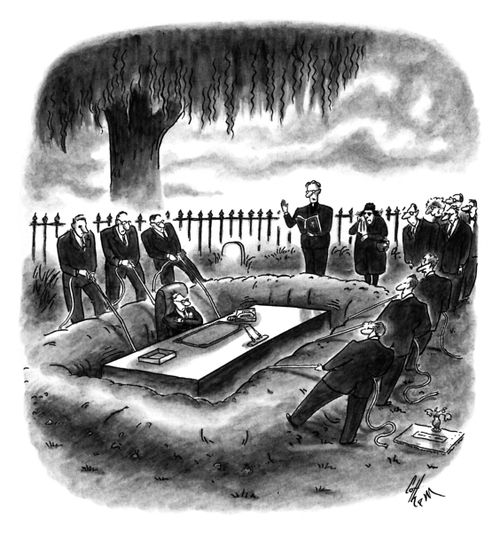 A dead business executive is lowered into the grave with his desk