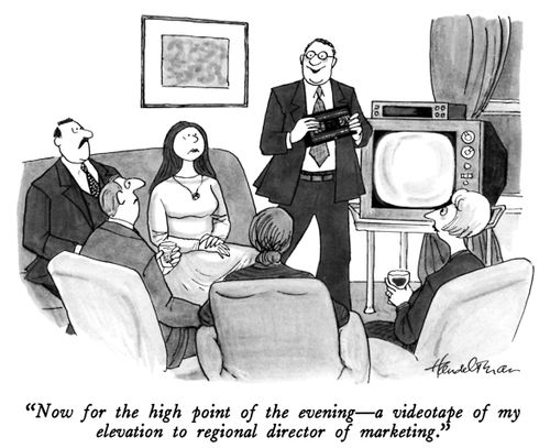 "Now for the high point of the evening - a videotape of my elevation to regional director of marketing."