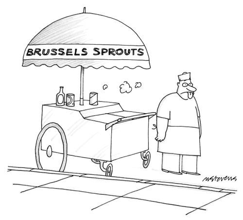 A vendor with his tongue stuck out in disgust stands next to a food cart selling brussels sprouts.