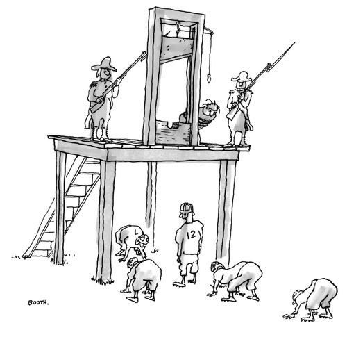 A football team lines up under a guillotine.