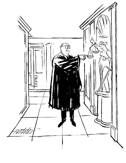 A judge plays with scales held by a statue of Lady Justice.