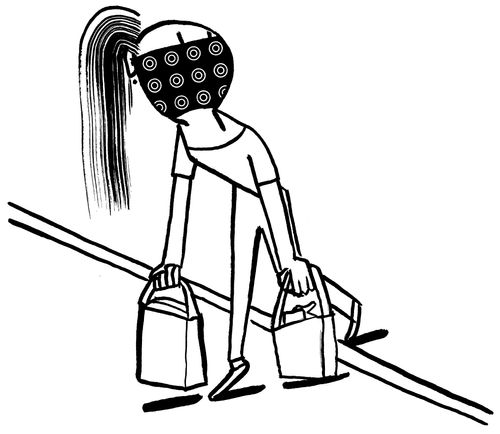 Lady carrying shopping steps out into the road wearing a face mask.