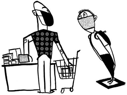Man unpacks trolley at till wearing a face mask.