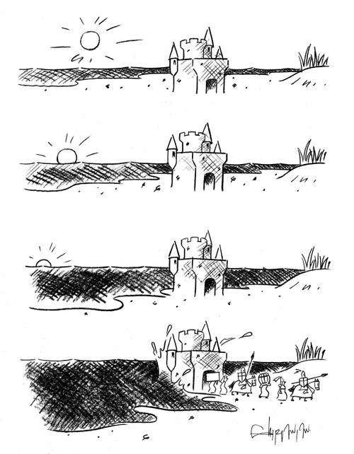 The tide comes in on a sand castle