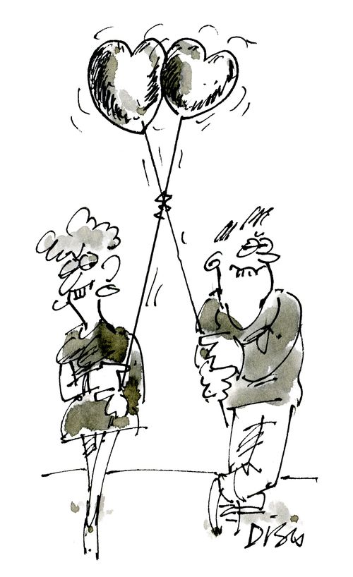 Couple with entwined heart balloons.
