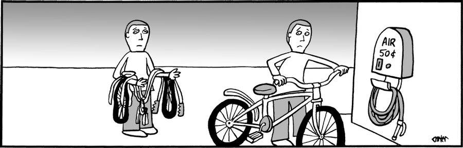 A man with a deflated bicycle stands in line at the tire inflator.