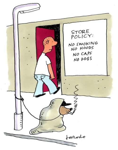 Man enters store forbidding hoods, caps, smoking and dogs.