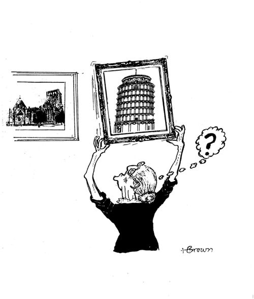 Woman trying to straighten a picture of the Leaning Tower of Pisa.