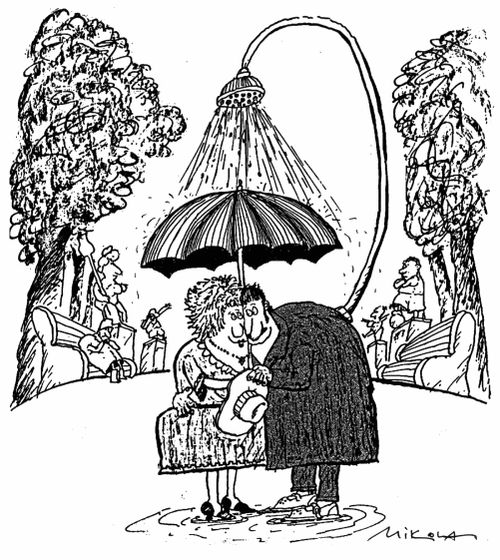 Couple cuddle under a sprinkler with an umbrella as an excuse to be close