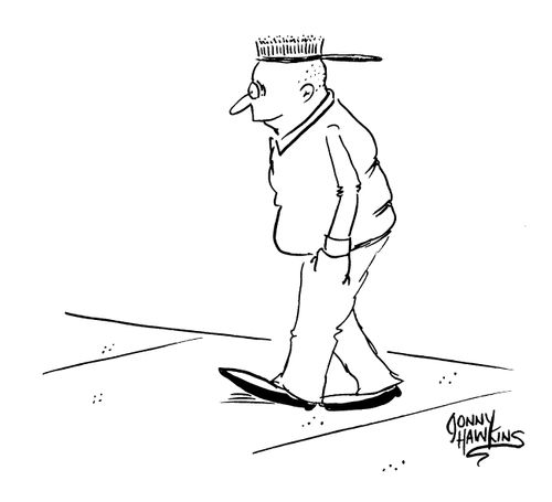 Bald man with a brush on his head