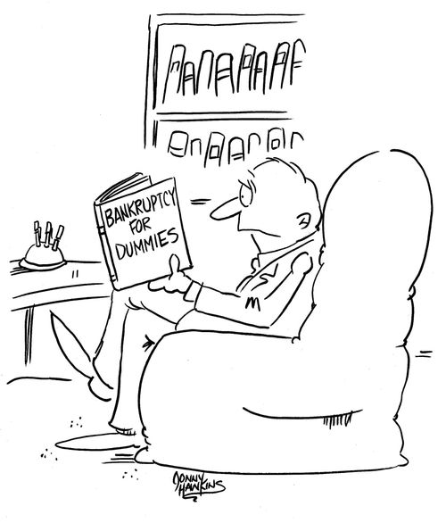 Man reading 'Bankruptcy for Dummies'.