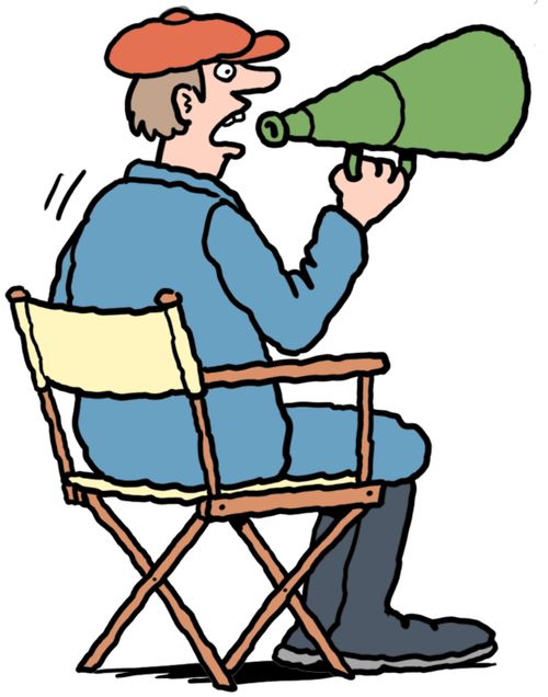 A movie director shouting through bullhorn.