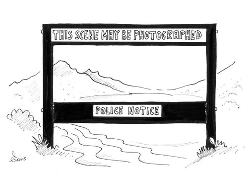 'This scene may be photographed - police notice.'