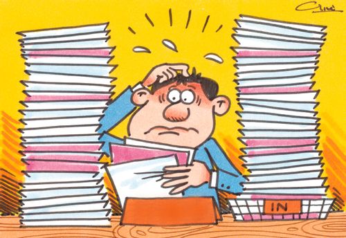 Man over loaded with sheets of paper and an 'IN' tray