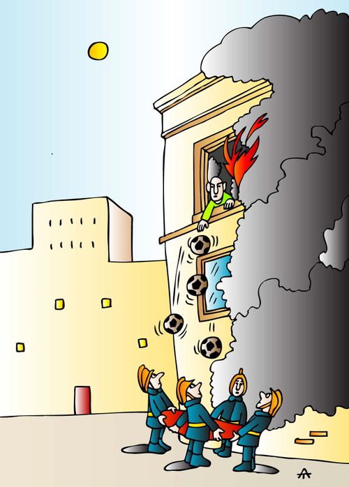 Rescuing footballs from a fire.