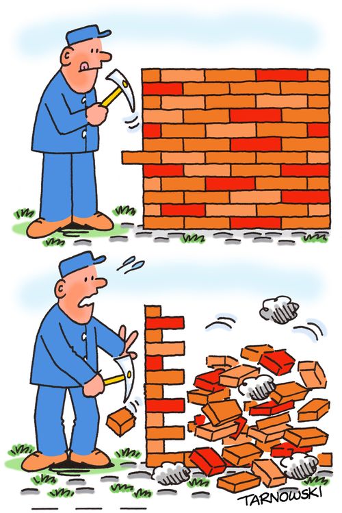 Builder adjusting a wall.