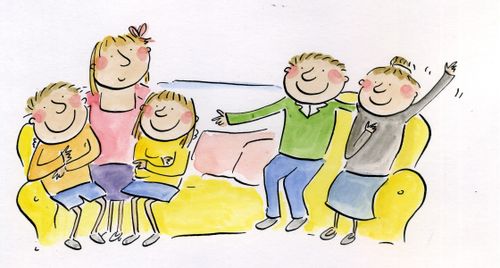 Family sitting on sofa.