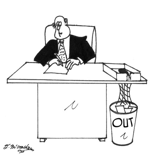 The 'In Box' on a man's desk is over a trash can labeled 'Out' with basketball net.