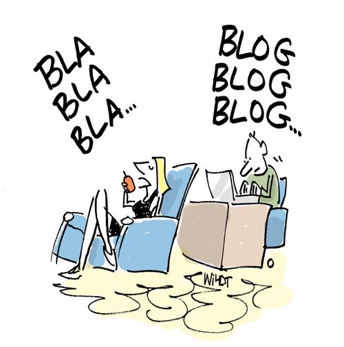 Person talks on phone as other blogs.