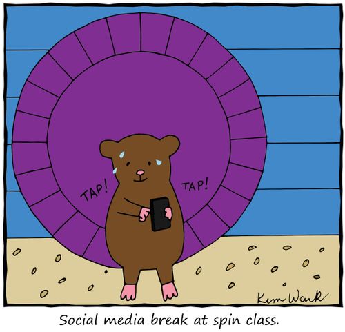 Social media break at spin class.
