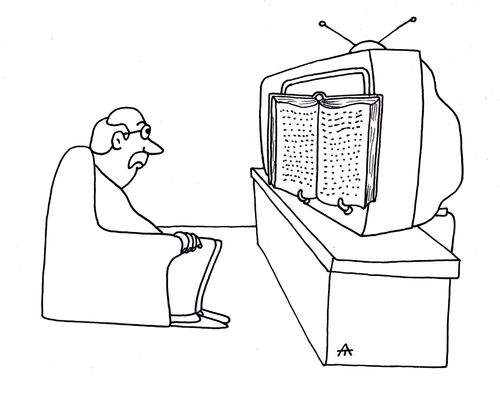 Man uses a television to hold up his book.