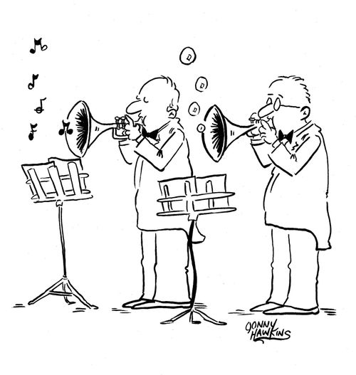 Man blows horn and bubbles come out.
