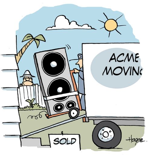 Moving van unloading huge speakers.