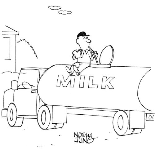Truck driver taking lunch break drinks out of tank of milk attached to his truck.