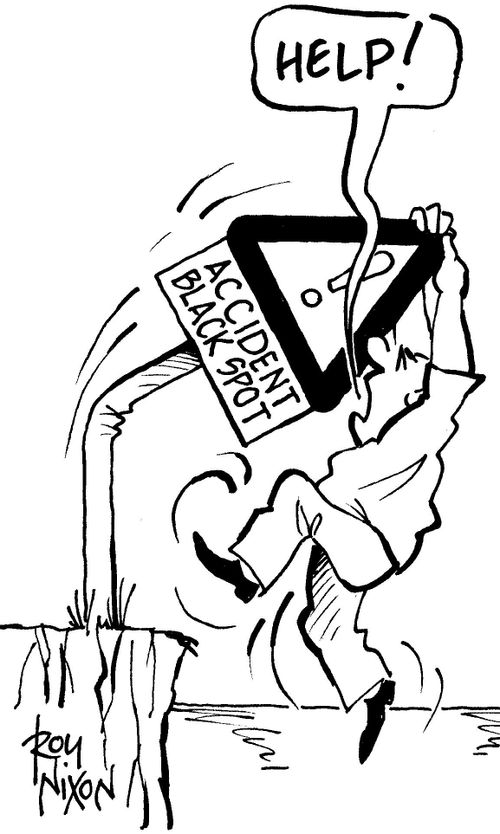 "Help!" (Man holding onto 'Accident Black Spot' sign).