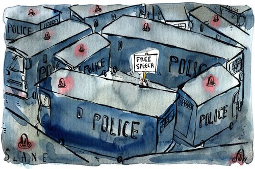 Free Speech is surrounded by police vans.