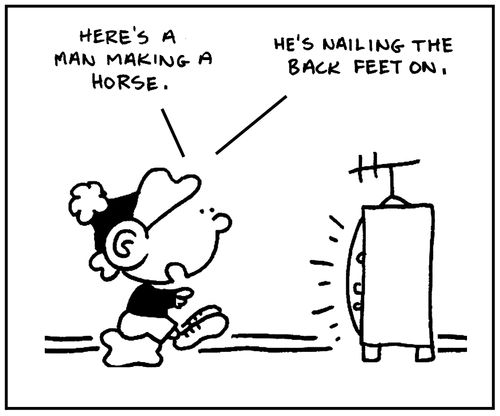 'Here's a man making a horse. He's nailing the back feet on.'