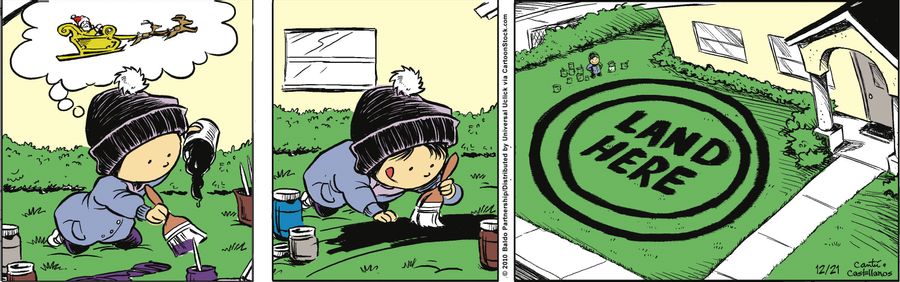 Gracie paints a landing pad for Santa on the lawn.